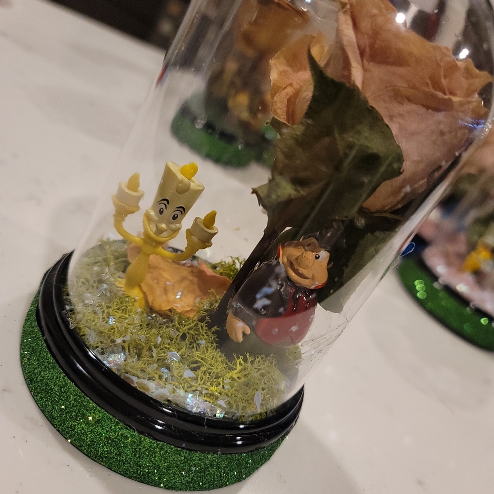 Candle stick Luminiere with Le Fou in the globe with Rose Beauty and the beast